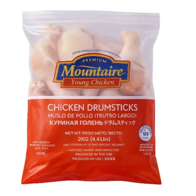 Paquete con 2kg de muslos de pollo.